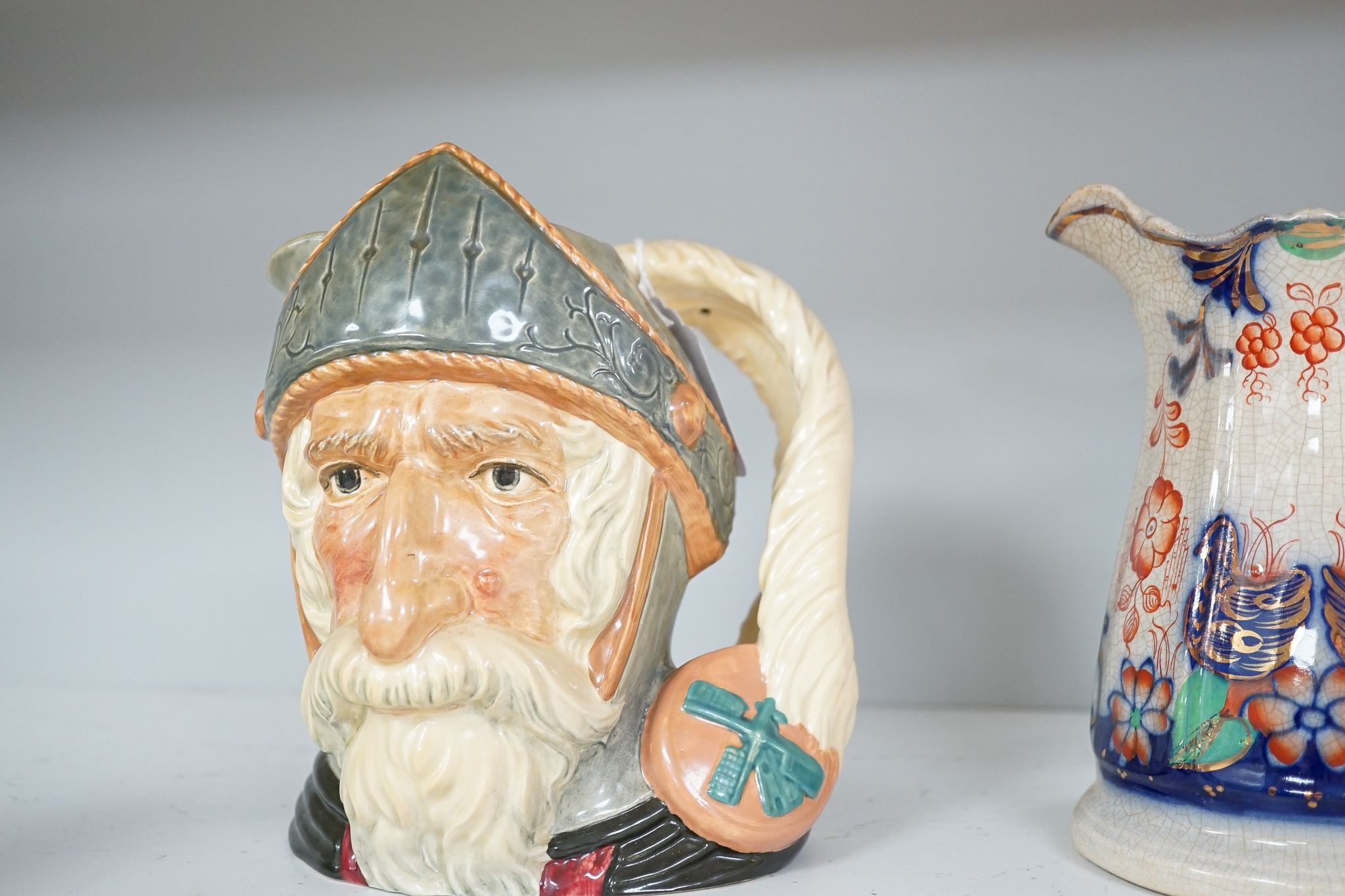 A Royal Doulton character jug and 6 other pieces including a Staffordshire figure group, tallest 25cm